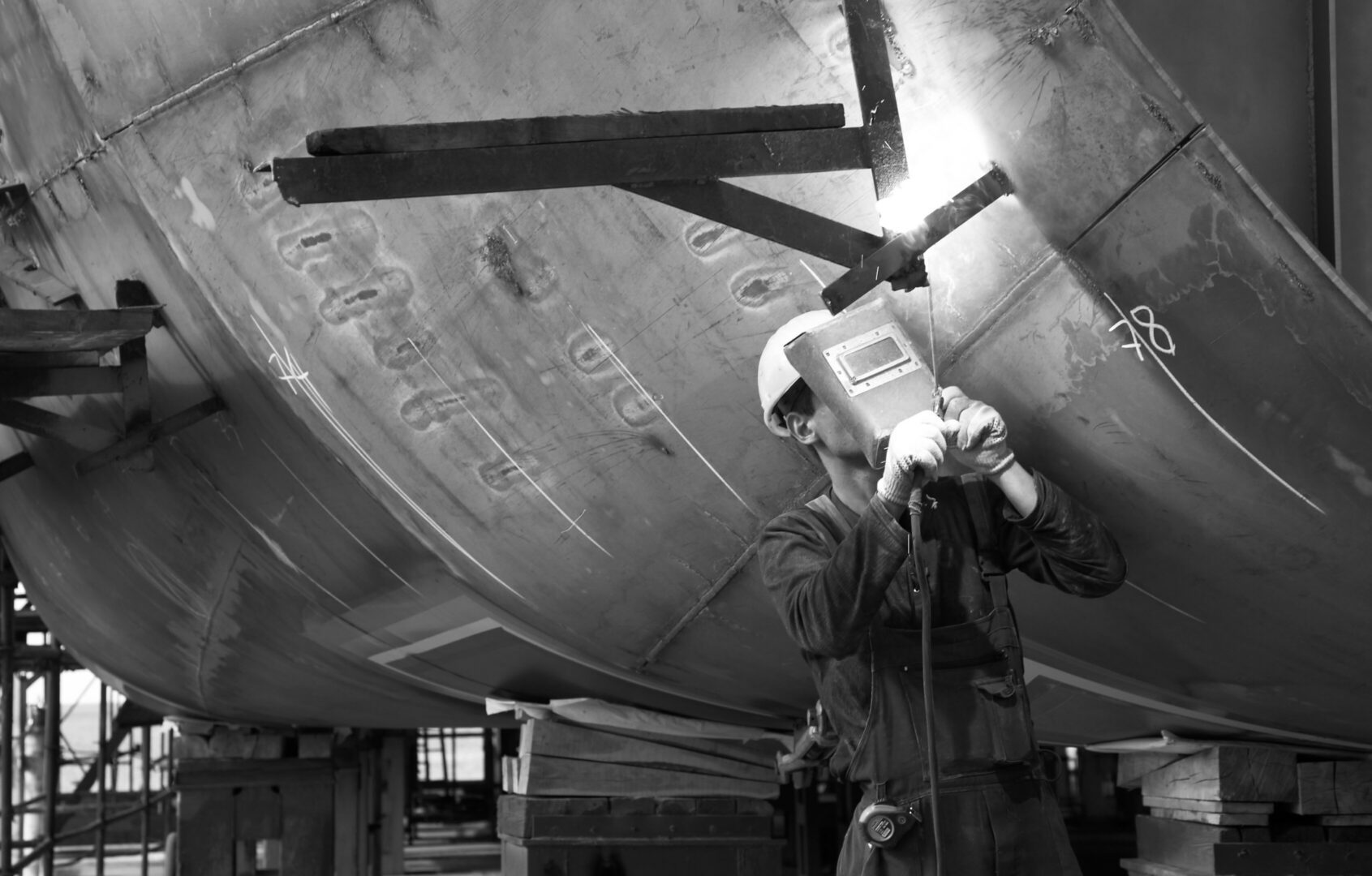Welder man in work